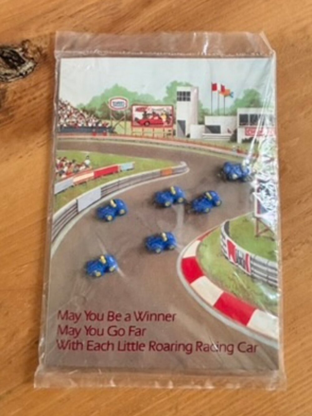 Set of 1983 vintage Avon "Roaring Racing Car" buttons on Card